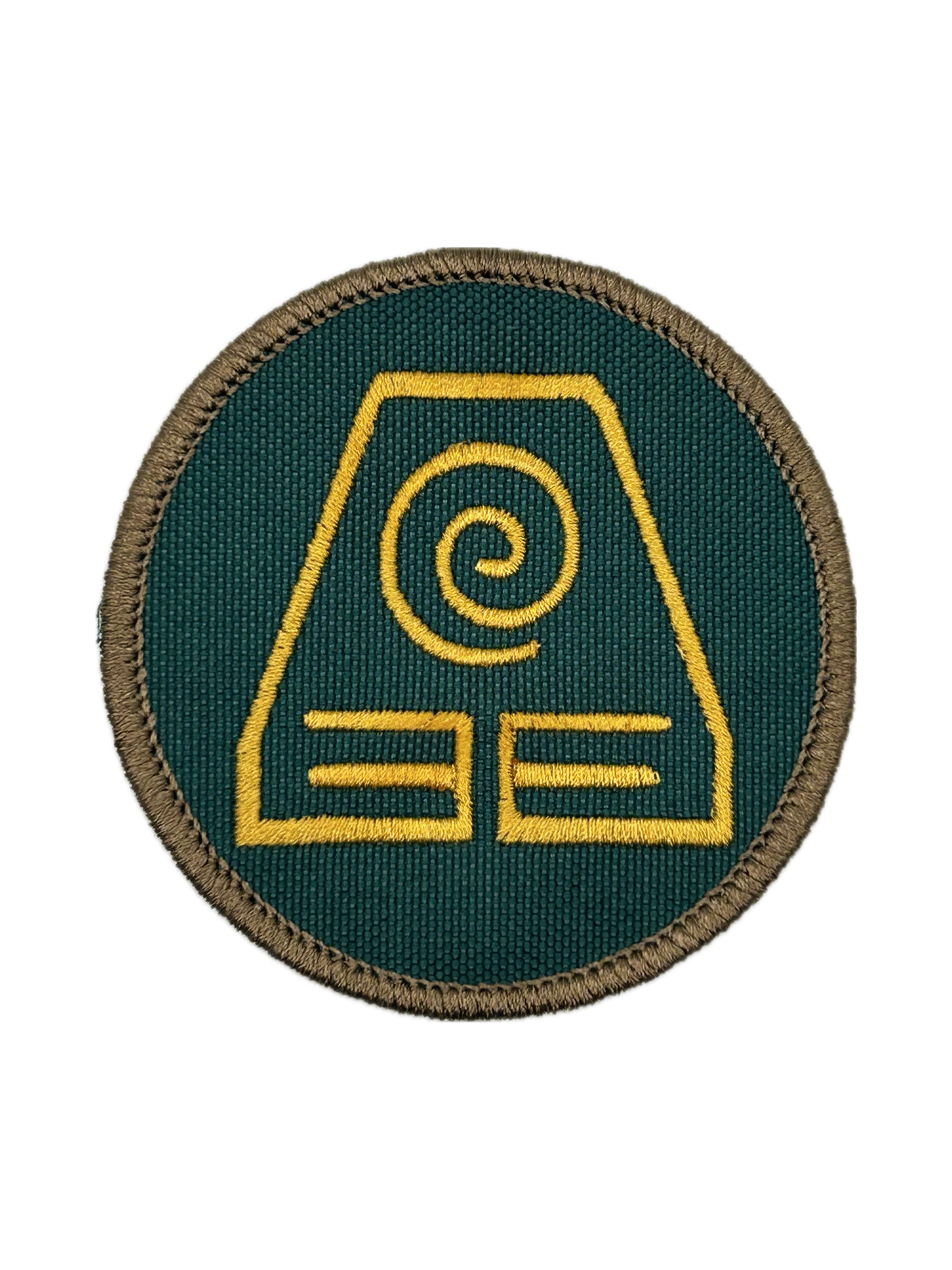 Circular patch with an earthbending yellow symbol on a green background
