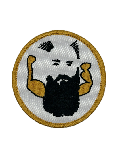 Circular patch with a stylized face and arms on a white background
